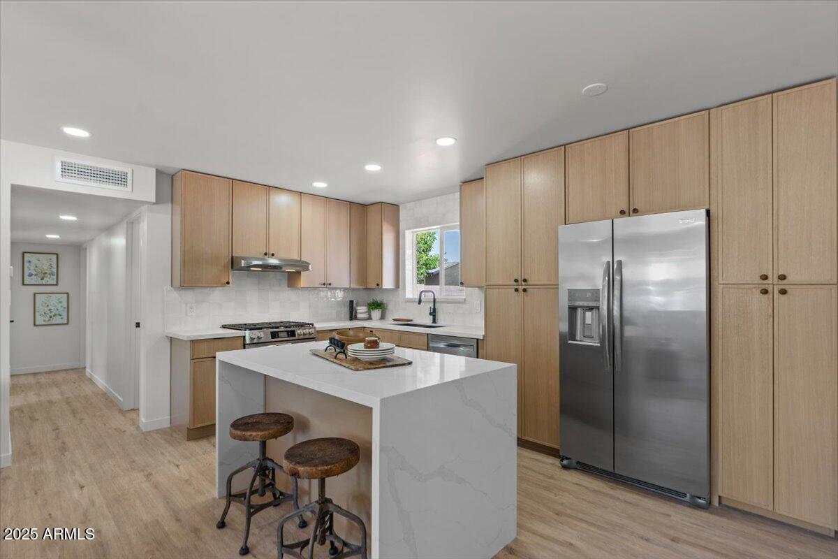 Slim White Oak cabinet installation